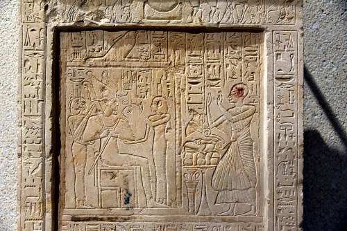egypt-ancient-and-modern:Funerary stele of Seba. Osiris is flanked by Isis and Nephthys. New Kingdom