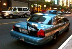 Inked4Life71:  Only In Seattle The Police Leave Their Ar On The Trunk Of Patrol Car