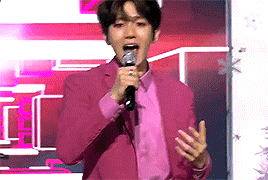 baehkkyun:  black haired baek in pink suit x black leather jacket  