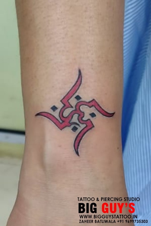 Swastik tattoo with om