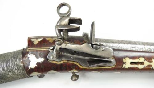 Silver and ivory decorated miquelet rifle, originates from the Caucuses, 19th century.from Auctions 