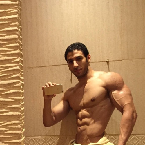 arabfitnessgods:  You can find this sexy Arab god in Dubai International Airport.   Flirted with him because of his solid and made for slamming body, but he said he is straight and engaged. I tried though… Lol..  Meet Mohamed Arafa - Egyptian born,