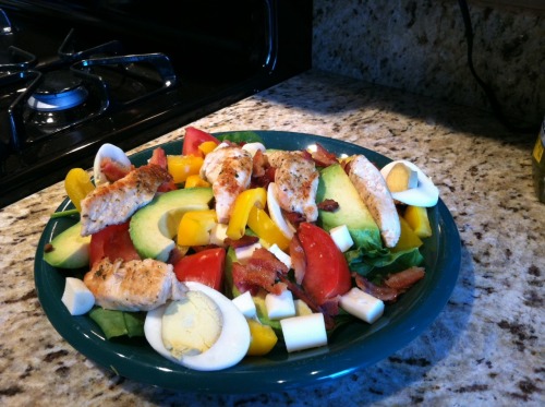 burpeesandbowties:  rachelsfithealth:  My Cobb Salad! Chicken breast  Hardboiled eggs  Cheese (any but I had mozzarella) Spinach  Yellow pepper Avocado  Tomato Crispy tiny pieces of bacon Bacon in oven: 375 degrees until crispy brown. Dab with a paper