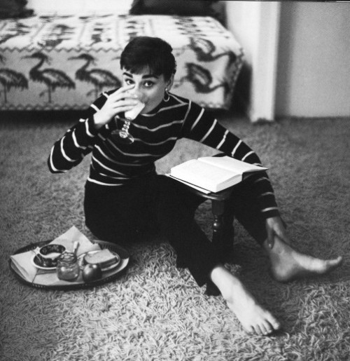 Audrey Hepburn on the phone at her  Beverly Hills apartment during the production of Sabrina (1953).