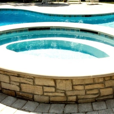 Rustic Pool - Water SlideExample Of A Huge Mountain Style Backyard Concrete Paver And Custom-shaped Natural