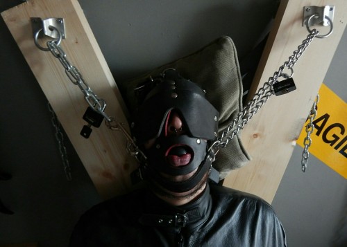 711-197-164:  An old session from last January:  • After stripping in the staircase outside the apartment, and giving away my clothes, • I was gagged and blindfolded, • spanked, flogged, and whipped, • put in a bondage bag, secured to St. Andrew’s