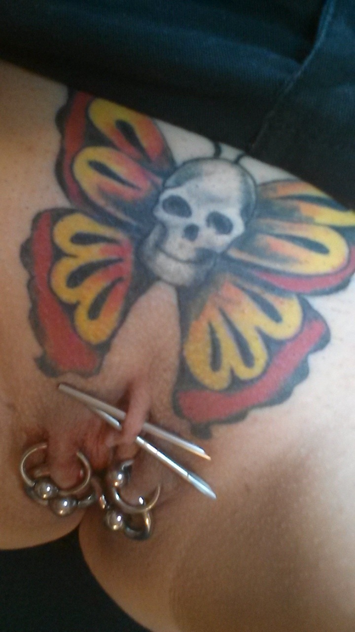 pussymodsgaloreShe has four inner labia piercings with rings, also two piercing needles