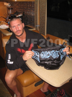 rwfan11:  Randy Orton- signing a pair of