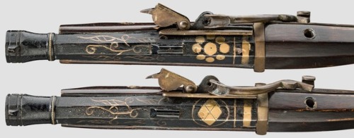 A matching pair of gold inlaid matchlock pistols, Japanese Meiji Period.from Hermann Historica