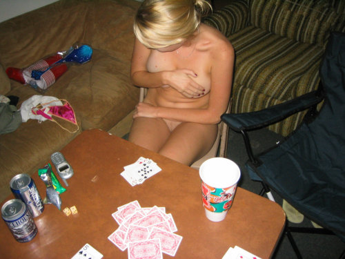 stripgamefan:  Second part of the ‘classic’ Strip Poker set: she loses the tank top (gets topless), and right at the end strips off her little thong and gets completely nude.  The photos to come continue with her still fully nude.