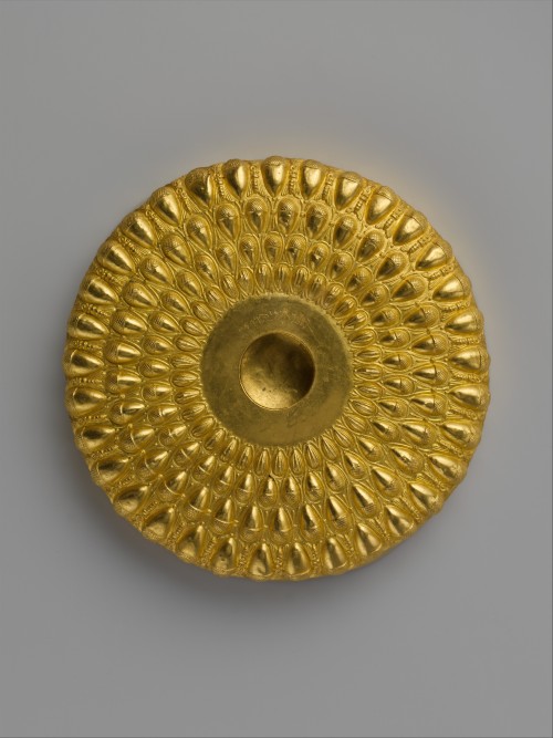 worldhistoryfacts: A gold libation bowl from Greece, 4th-3rd century BCE. It’s embellished wit