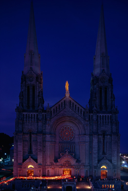 Candles mark a procession leaving Sainte-Anne-de-Beaupre in Quebec, 1971.Photograph by James L. Stan