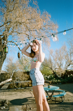 americanapparel:  Alex wears the Flamingo Print Bikini Top and Acid Wash High-Waist Jean Cuff Short, March 2014.