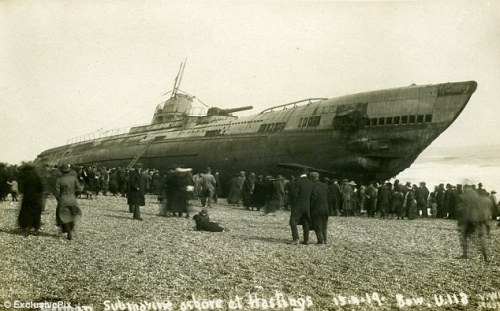 The German submarine U-118, which surrendered at the end of World War I.  The U-Boat was being towed