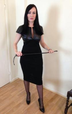 modernfemdom:  Strict office look… Production meetings are so much fun  If only!