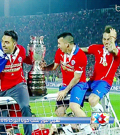 mishal-77:  Gary Medel and Eduardo Vargas celebrating the Cup over the crossbar. | 04.06.2015 