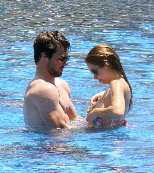 toplessbeachcelebs:  Una Healy (Singer) swimming topless at a resort in Spain (July 2010)