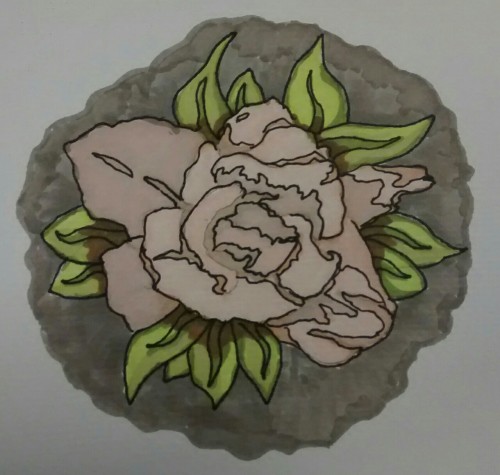 Working on a flower with design markers