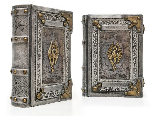  Aged white leather journal with the Skyrim map in the center of the front cover. Over the map is mo