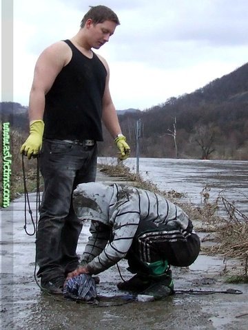 Cowering wimp forced to kiss the mud and clean his tormentor&rsquo;s boots. Manhandled robb