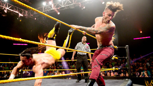 Porn pezziecoyote:  Corey Graves vs Adrian Neville, photos