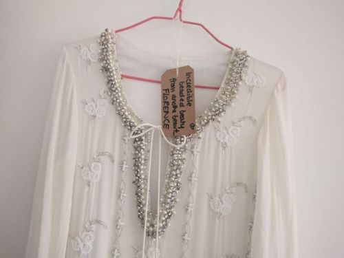 This is the gorgeous flowing white beaded dress donated by Florence to the Rumble in the Jumble char