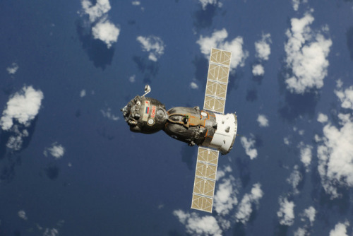 View of Soyuz TMA-08M vehicle with the Earth&rsquo;s surface in the background taken after undoc