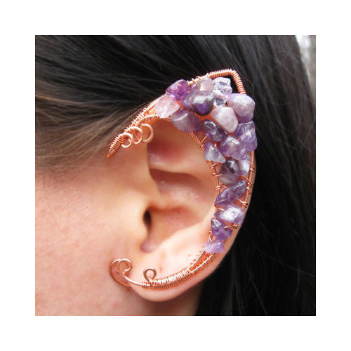 wickedclothes:  Amethyst / Copper Elven Ear Cuffs Pieces of fine amethyst are attached to this elven ear cuff. Crafted out of non-tarnish copper wire, the ear cuff is accented by small swirls and requires no ear piercings to be worn. Sold on Etsy. 