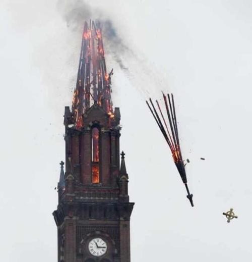 evilbuildingsblog:Church steeple in Baltimore hit by lightening today, an approaching fire chief too