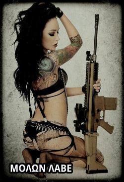 guns-and-babes:  Babe with gun