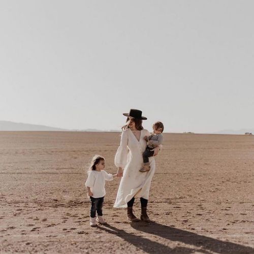 Beautiful photograph of @herfolk and her children. Sybil wears our Zinnia Dress in cream &hellip