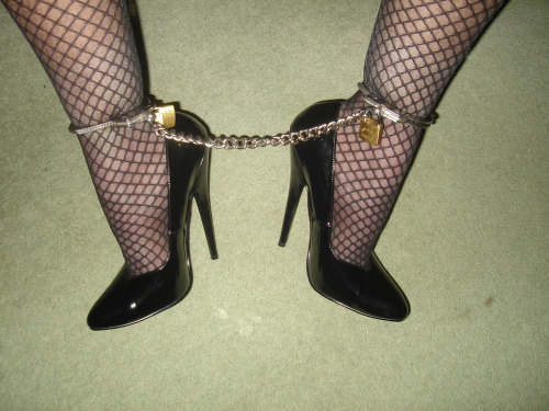 bondagegallery:  Feet, ankles cuffed 1  adult photos