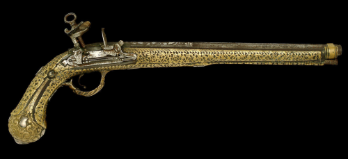 A miquelet pistol decorated with gold plated silver mounting.  Originates from Sardinia, late 18th c