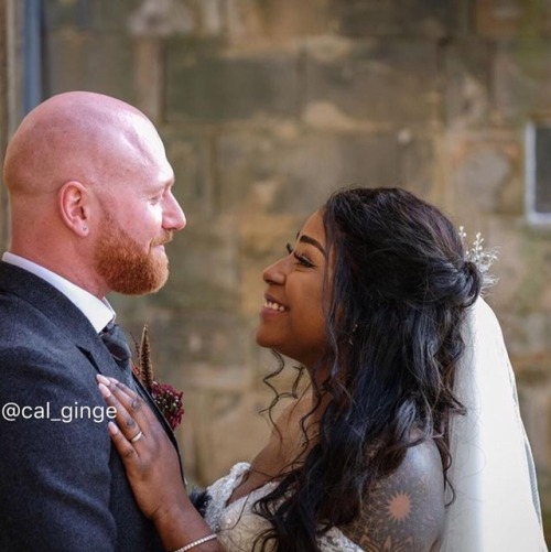 Love the way he looks at her. Priceless! Congratulations!