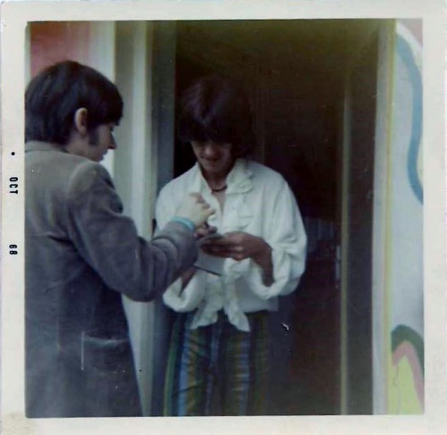 George Harrison and Pattie Boyd standing at the door of Kinfauns in Esher, England. (1968) Photos by