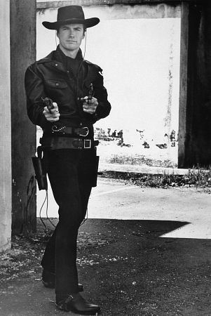 outlawleather:Clint as bad boy in double gun rig. Like this better than the man with no name. 