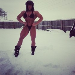 fbbfan1:  Not even the freezing cold snow can harm the powerful muscles of a perfect muscular woman.