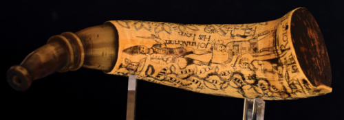 Ornately scrimshawed gunpowder horn belonging to John Norton, crafted by John Rous, circa French and