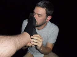 yngrawcumdump:  Worshipping a guys HOT socks before taking his raw dick in an adult theatre.  