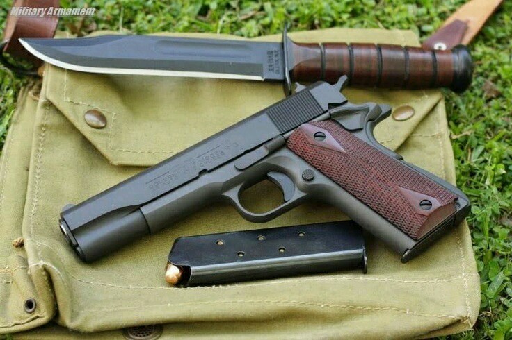 rollerman1:  Colt 1911 with a Kabar knife 