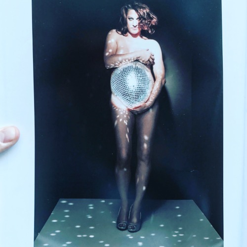 amandapalmer: DISCO BELLY. yes. that is my actual, real, 9-month pregnant belly - after 1,268 little mirrors were applied to it for this photoshoot.   the photo just came out in a book called “the belly art project”, the brainchild of spanx CEO sara