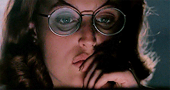 wowdanascully:Scully + “when she gets computer reflection light on her glasses” {requested by anonym