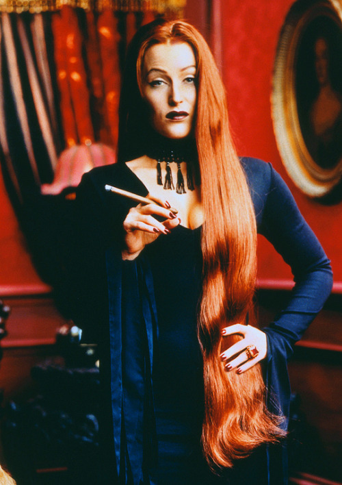 qilliananderson:Gillian Anderson as Morticia Addams photographed by Mark Seliger for US magazine 199