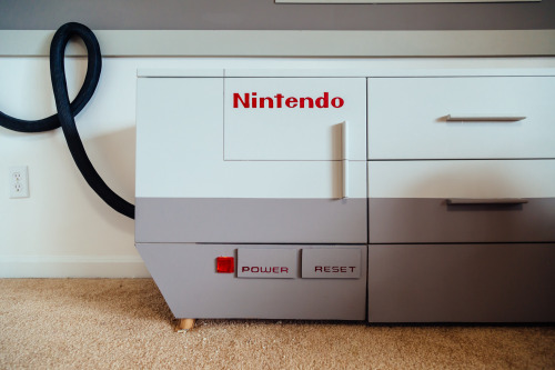 archiemcphee:  This giant Nintendo Entertainment System and controller are a fully functional and geektastically clever home entertainment system created by Imgur user tylerfulltilt. He modified a 3-drawer cabined from Overstock to look exactly like the