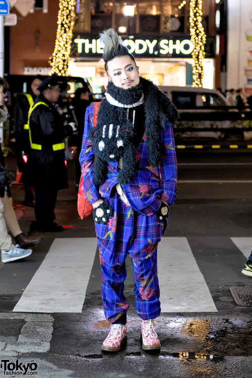 Japanese DJ and pianist Ohshi on the street in Harajuku wearing a plaid suit by MalkoMalka with a ca