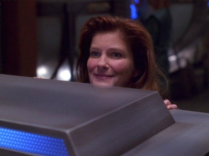 janeway peeking/smiling