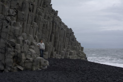 sixpenceee:  Black sand beaches occur where lava flows enter the sea. The sand is quenched lava that is mostly glass. The finely divided glass and crystals weather quickly so the beaches don’t usually last for long periods. They are located in various