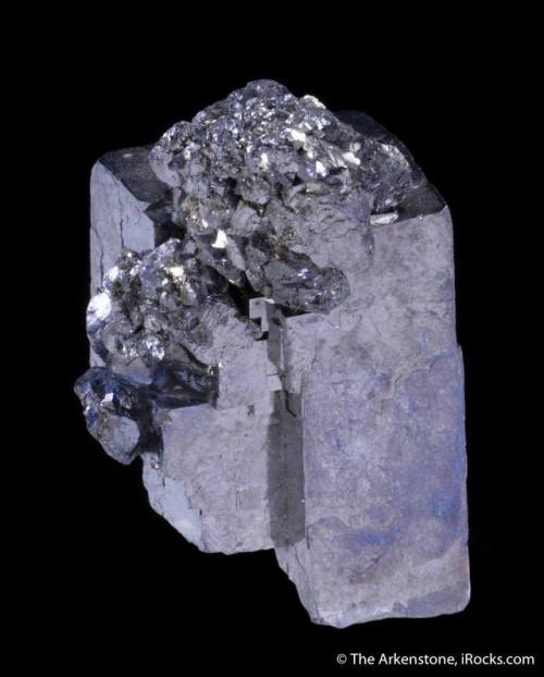 Double sulphideSitting atop a sizeable oblong crystal of the common lead sulphide mineral galena (se