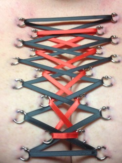 lexxxiluxe:  So- this happened recently! I got a 22 ring breast corset pierced with 10g rings (woohoo!) It’s temporary (3 days, it’s already been removed) and should heal fine and without marks if I take care of it properly, but look how pretty it