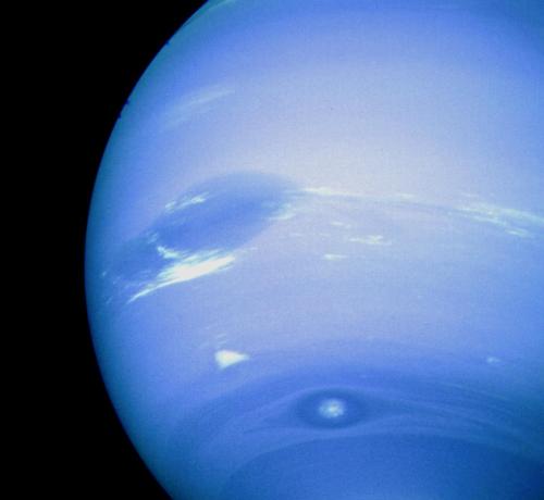 This photograph of Neptune was reconstructed from two images taken by Voyager 2’s narrow-angle